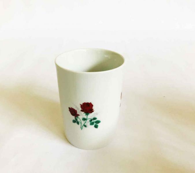 cup with roses
